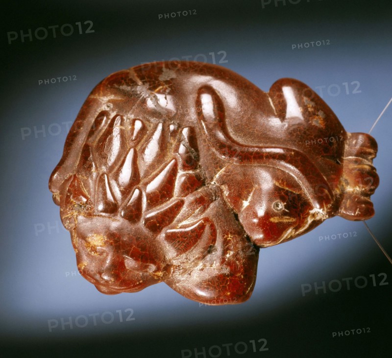 Lion pendant propably worn as an amulet