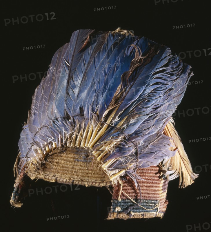 Fez style hat with feather plumes