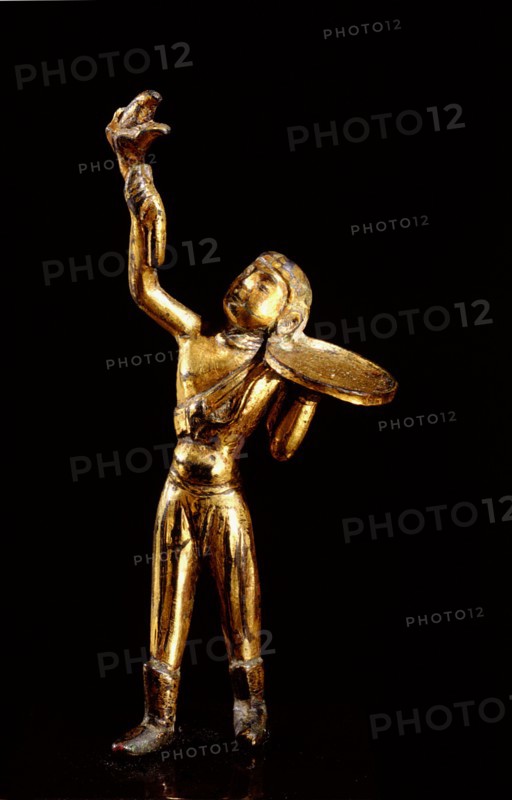 Gilded bronze figure of a man holding a tray and offering a flower