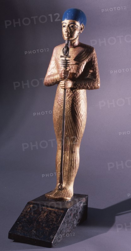 Gold statue of Ptah god of Memphis   patron of artists and craftsmen from the Tutankhamun burial