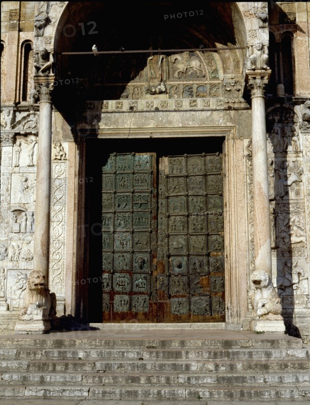 Detail of the facade of the Basilica of San Zeno, Verona, showing the bronze door