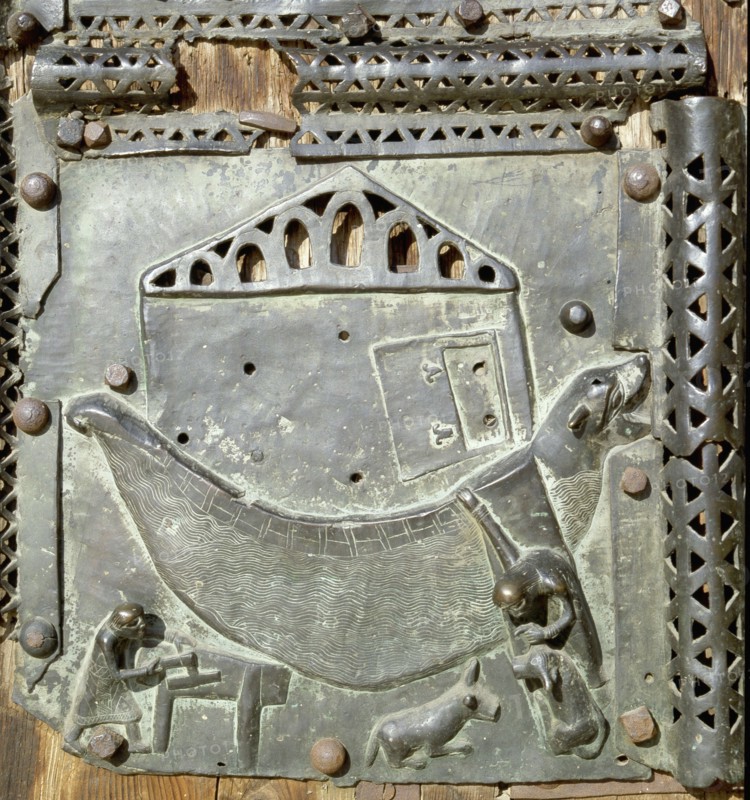Detail of the bronze door of the Basilica of San Zeno which is decorated with 48 panels illustrating biblical stories and the lives of St Peter, St Paul, St Zeno, St Helena among others, and items connected with music and the three Theological Virtues