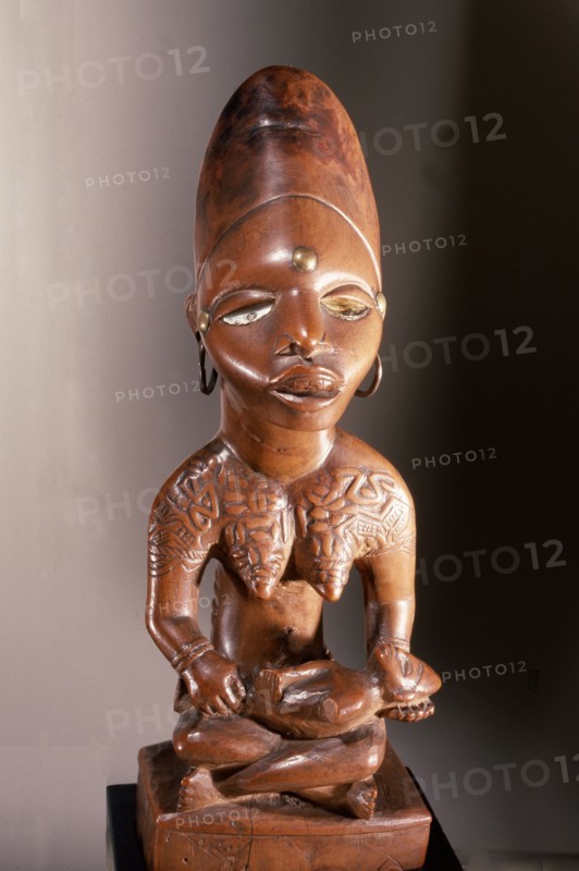 Mother and child carving (phemba) honouring female reproductive power, an idealised image of womens role, and by implication of the growth and wealth of the kingdom