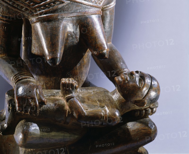Mother and child carving (phemba) honouring female reproductive power, an idealised image of womens role, and by implication of the growth and wealth of the kingdom