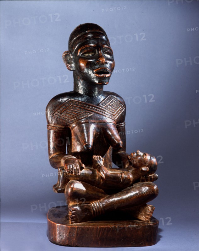 Mother and child carving (phemba) honouring female reproductive power, an idealised image of womens role, and by implication of the growth and wealth of the kingdom