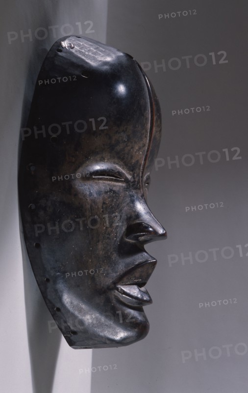 Mask of a type called Deangle, which collects food from village women and brings it to boys secluded in the bush circumcision camp