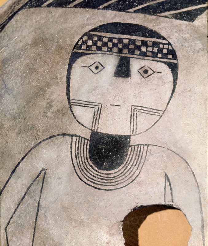 Detail of a pottery bow painted with a human figure