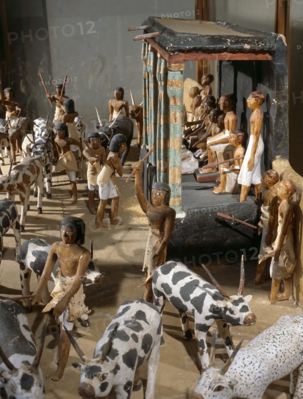 Wooden model depicting the tomb owner Meketre and his son, assisted by scribes and herdsmen, inspecting and counting his livestock