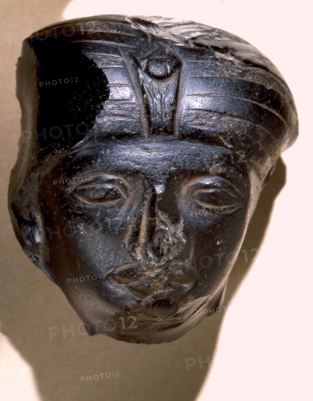 Fragmentary obsidian head of a Middle Kingdom queen