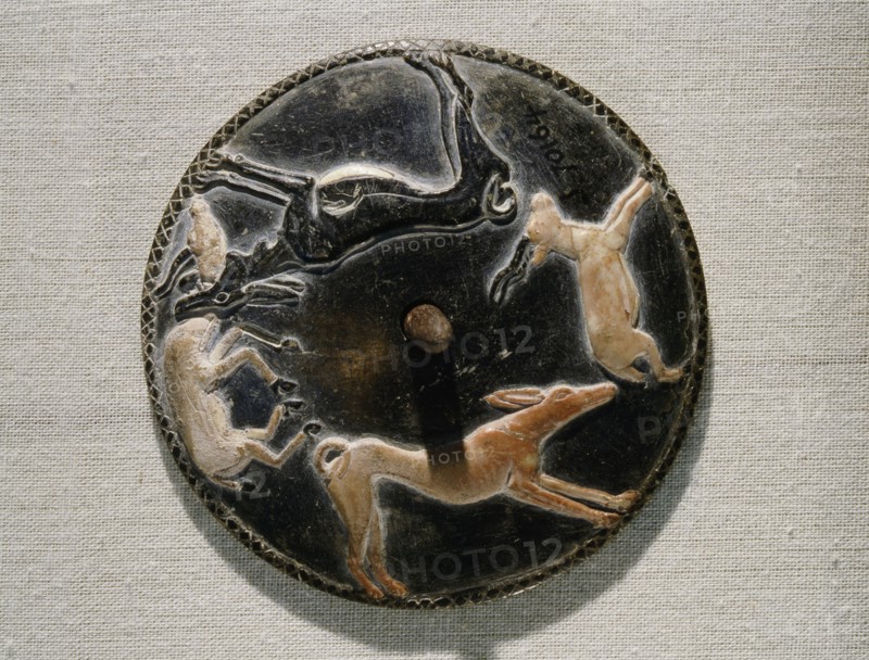 A gaming disc, one of 45 made of various materials and variously decorated, found in the mastaba of Hemaka, an official of King Den