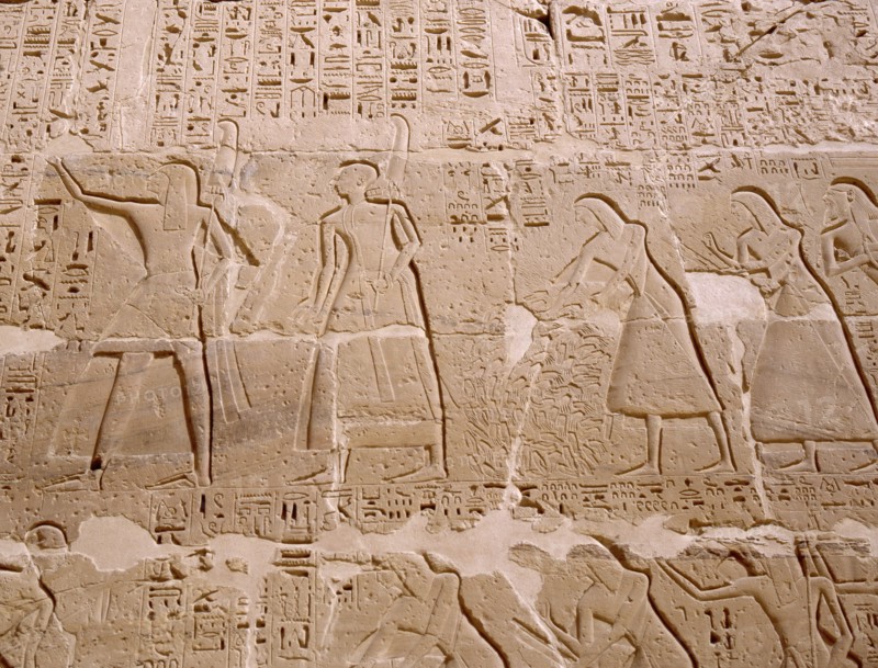 Relief depicting priests scribes and captives being presented to Ramesses III, from his mortuary temple