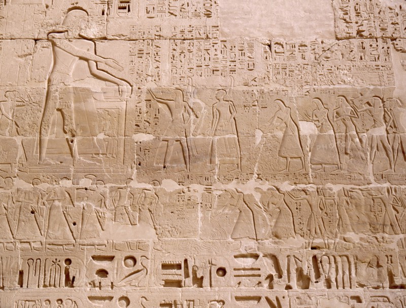 Relief depicting priests scribes and captives being presented to Ramesses III, from his mortuary temple