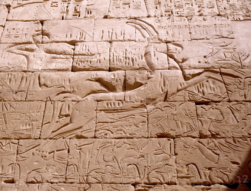 Battle scene relief with Ramesses III in his chariot fighting the Libyans, from his mortuary temple