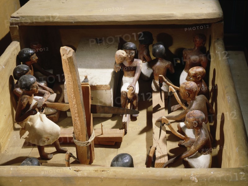 Wooden model of a carpentry workshop with craftsmen at work