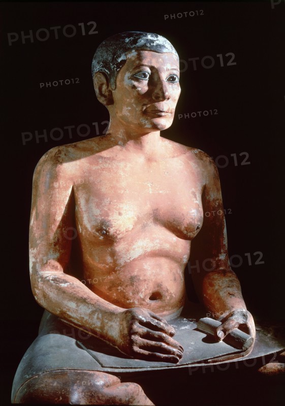 The Scribe du Louvre shows a man in the typical squatting posture of a scribe with a roll of papyrus on his lap