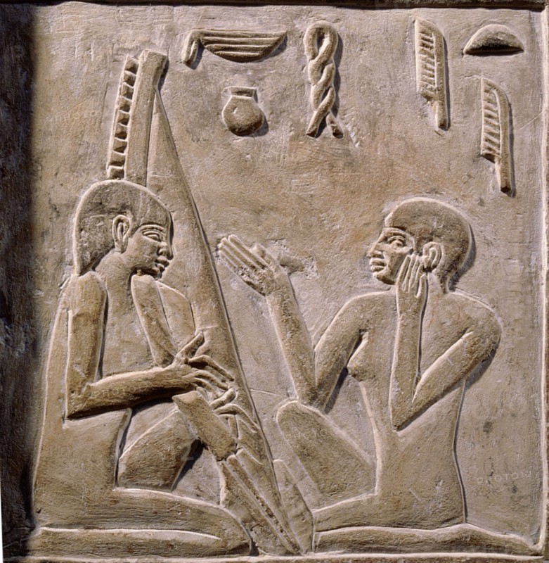 A relief on the false door of Nikaure showing two women singing and playing the harp