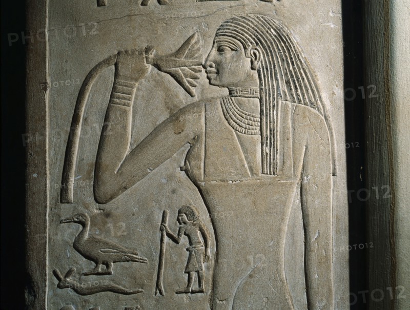 A relief on the false door of Nikaure who was a priest of the god Ra and the goddess Hathor in the sun temple of King Neferirkare