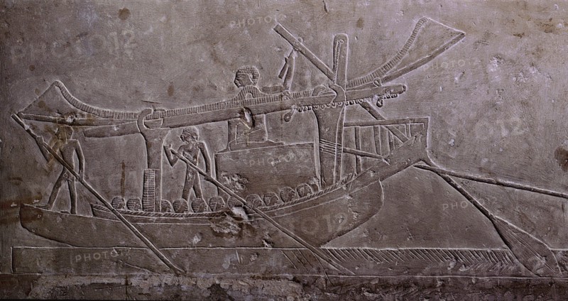 A limestone relief from the tomb of Ipi depicting a boat with its sail furled and carrying a huge block of stone