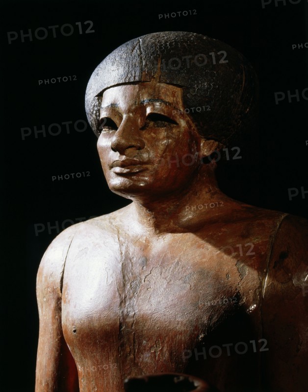 Sculpture of a male figure, thought to be from the funerary temple of Mentuhotep at Deir el Bahari