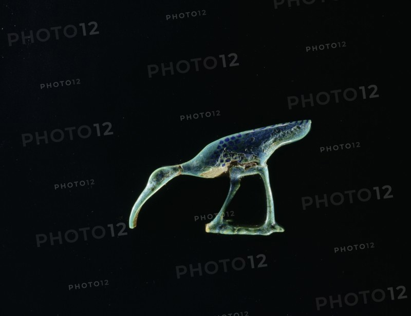 Blue glass furniture inlay in the form of a wading bird hieroglyphic sign