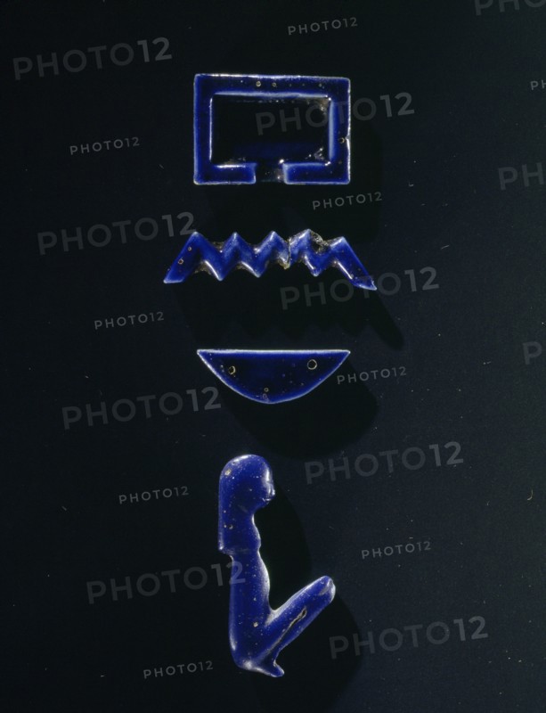 Four blue glass furniture inlay in the form of hieroglyphic signs making up the name Per neb