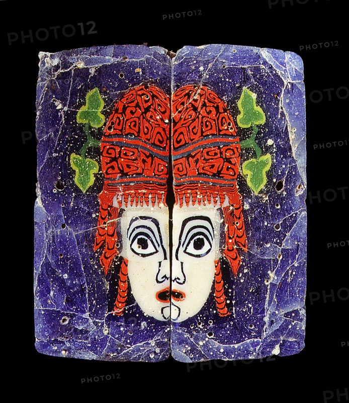 Glass fragment, a hetaira ( courtesan ) theatrical half mask