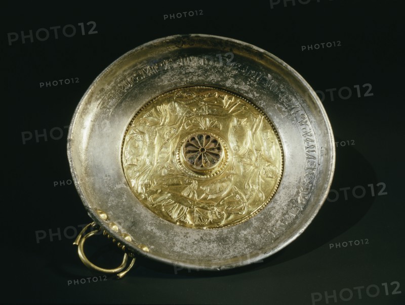 Silver bowl with gold handle and inset repousse gold centre, decorated with an aquatic scene showing four young girls swimming amongst lotus flowers and fish