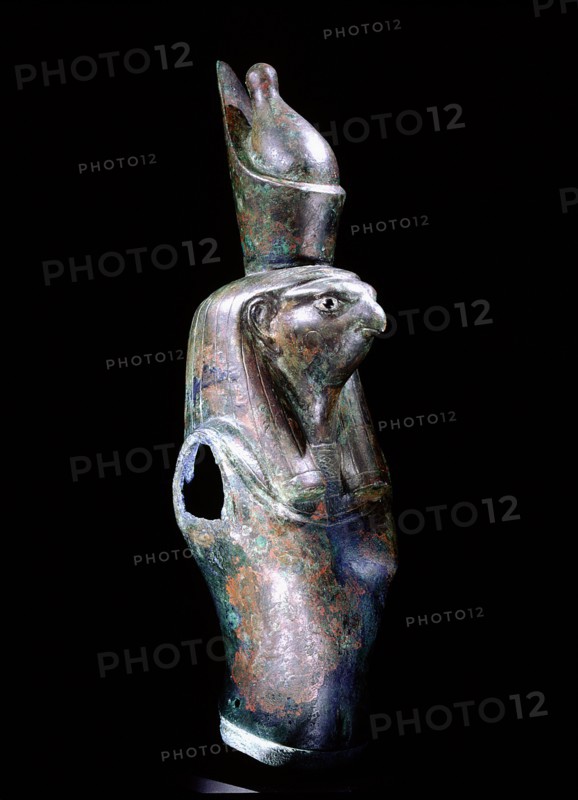 Fragment of statue depicting Horus wearing the double crown of upper and lower Egypt