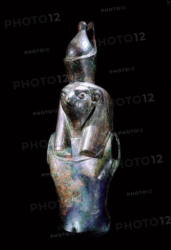 Fragment of statue depicting Horus wearing the double crown of upper and lower Egypt