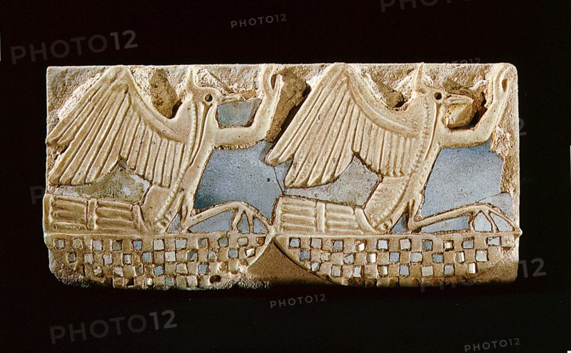 Tiles from the mortuary temple of Ramesses III at Medinet Habu depicting lapwings with human arms raised in an attitude of adoration