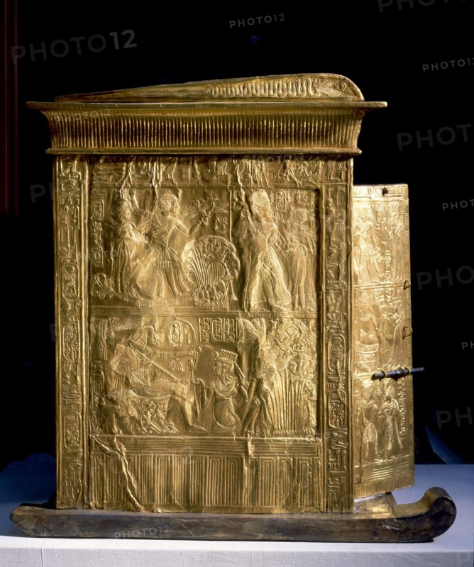 The little golden shrine of Tutankhamun containing the pedestal with the kings nomen and prenomen