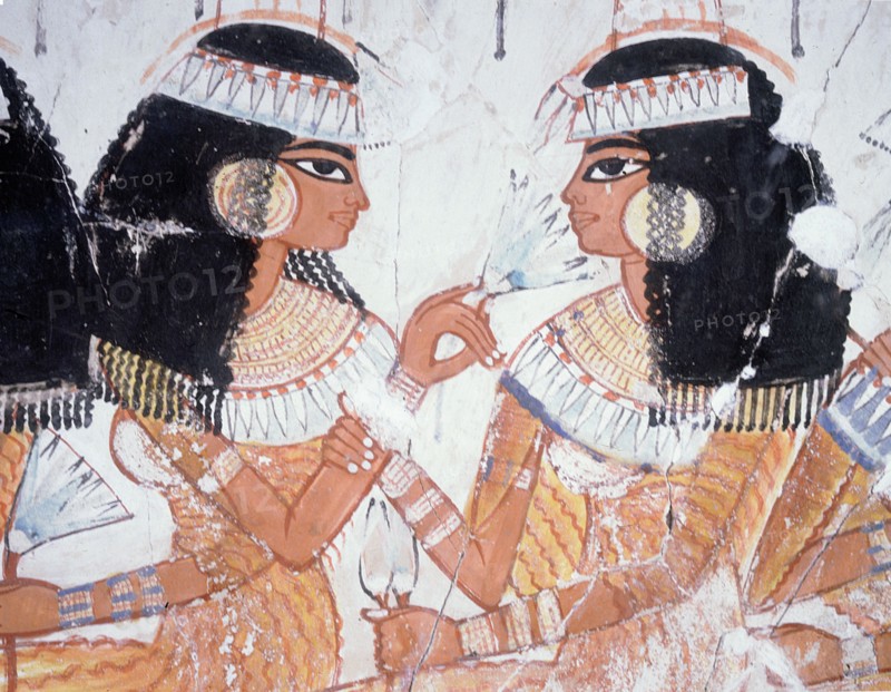 A detail of a wall painting from the tomb of Nebamun depicting women guests at a banquet