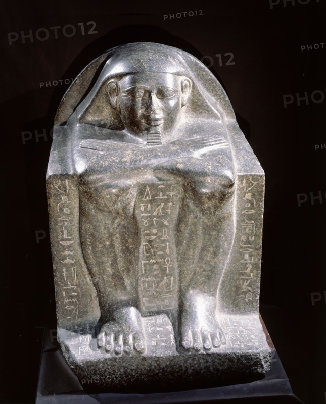 The two block statues of Hotep in Cairo Museum are the earliest known examples of what was to become a popular form