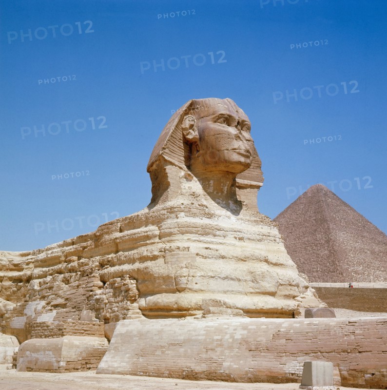 The Giza Sphinx with the pyramid of Khufu in the background