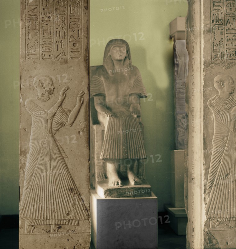 Limestone statue and two pillars with reliefs of adorants from the tomb of Ptahmose, priest in the temple of Ptah