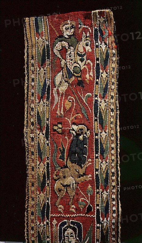 Detail of a Coptic textile, showing a mounted knight, possibly St
