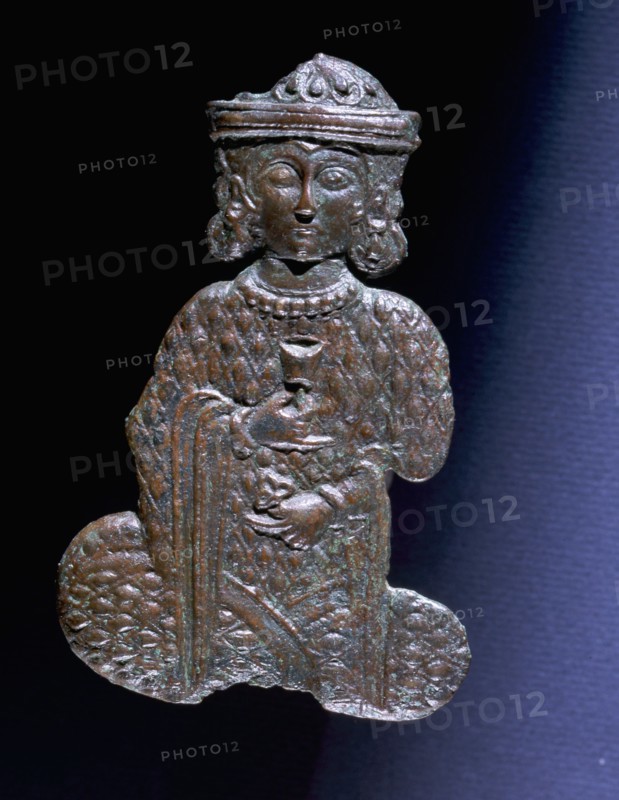 Copper figure of a courtier holding a wine glass