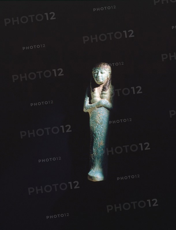 A faience shabti from the burial of Shoshenq II