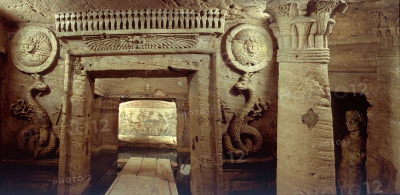 The extensive complex of burial chambers at Kom el Shuqafa, combining Greek and Egyptian design elements