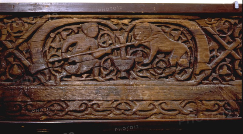 Wood plank with daily life scenes in the Fatimid court