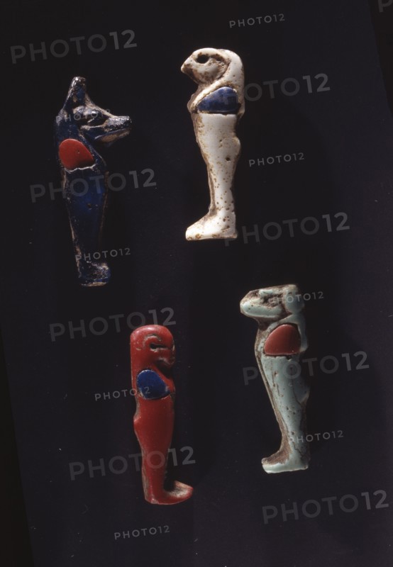 Glass furniture inlays depicting the Horus, Anubis, Osiris, and an unidentified deity