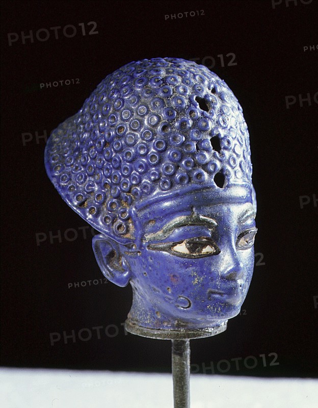 Miniature blue glass paste head of the pharaoh Amenophis III, wearing the blue war crown