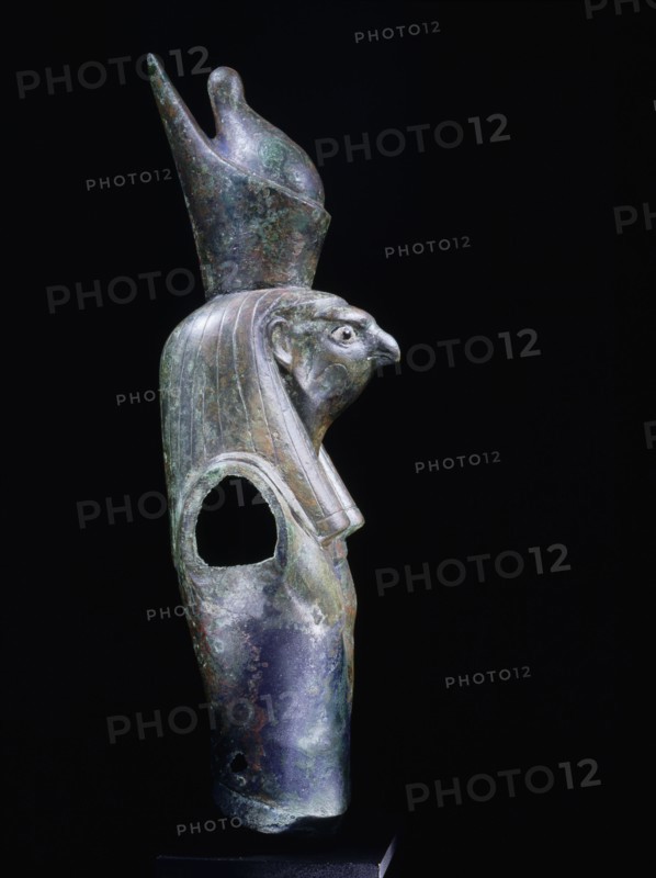 Fragment of statue depicting Horus wearing the double crown of upper and lower Egypt