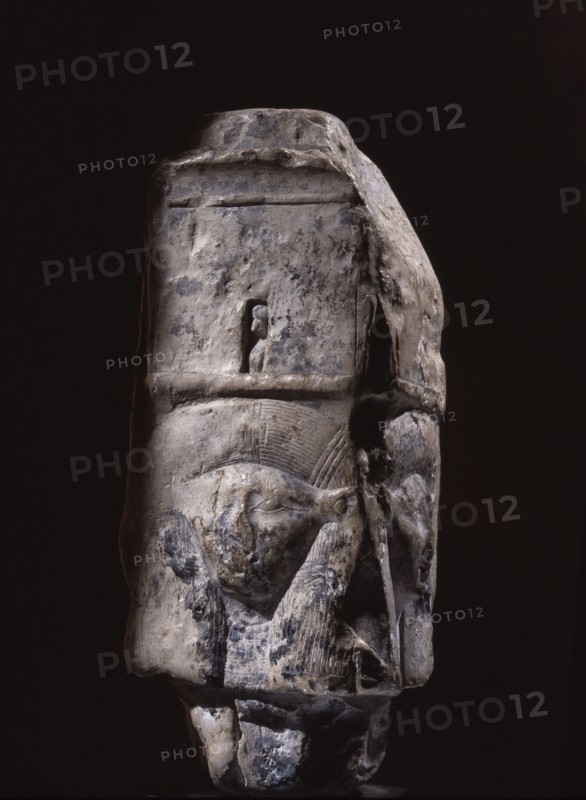 Relief carving of the head of the goddess Hathor on a limestone capital
