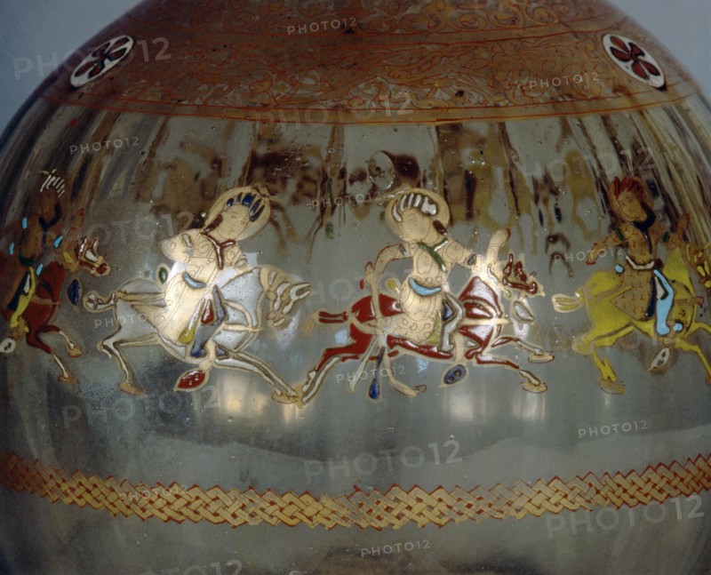 Mamluk glass hookah base decorated with images of polo players, Country of origin: Egypt