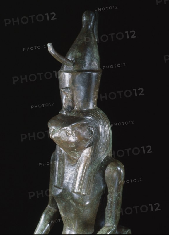 Figure of the god Horus in his falcon head aspect, wearing the double crown