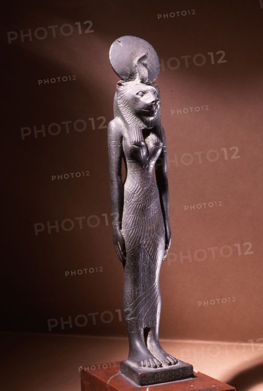 Bronze figure of the lion headed goddess Sekhmet with sun disc and uraeus