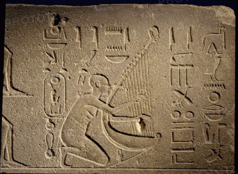 Detail of a relief depicting a musicians and acrobats