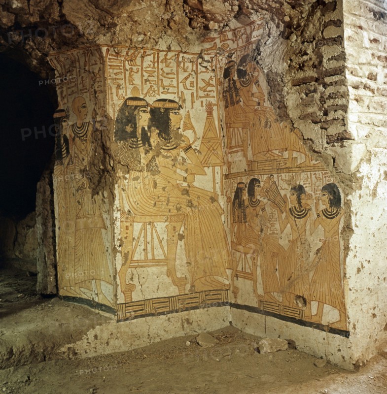 A detail of a painting in a private tomb showing the owner and his wife seated on chairs