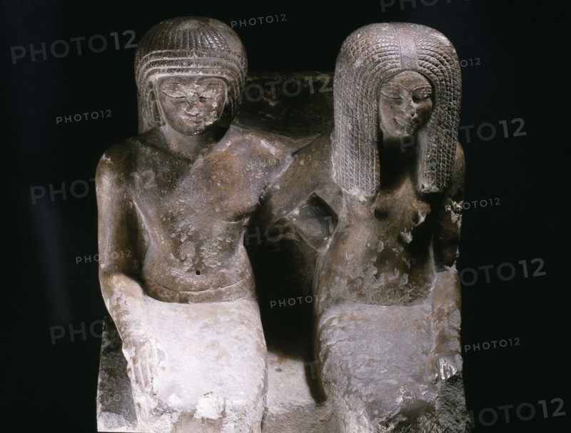 Pair statue of the fan bearer Mery and his wife Saty, incribed as an offering to Horus at Edfu